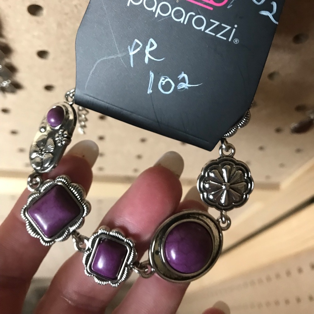 Small silver bracelet with darker purple crackle.